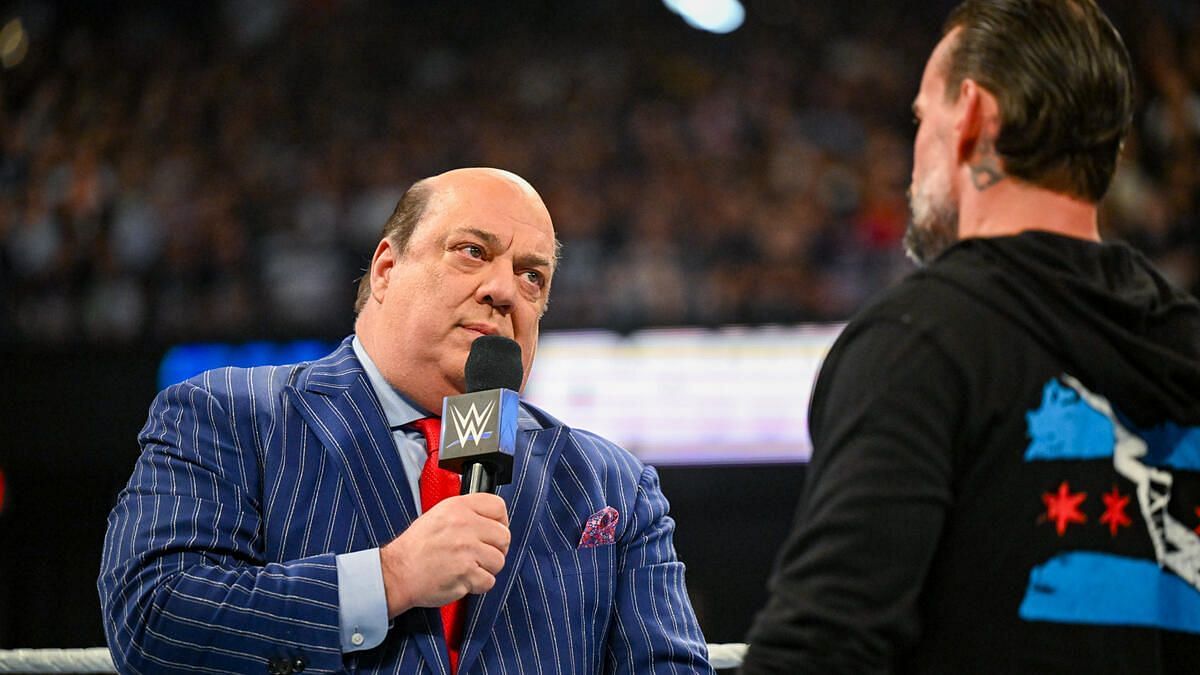 Paul Heyman with CM Punk (Photo credit: WWE.com)